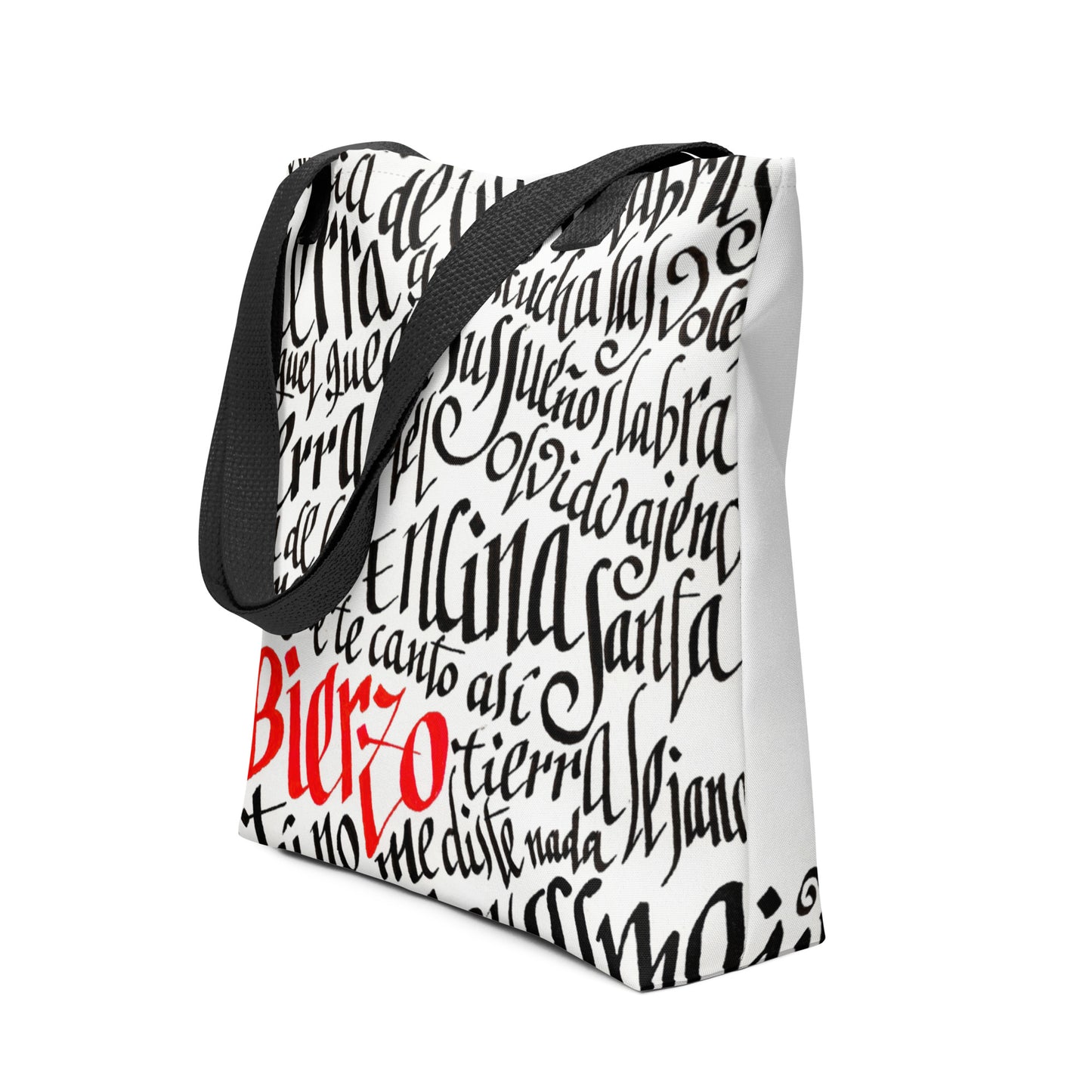Letra de la canción de Miguel Guerrero : Bierzo tierra lejana. letras caligráficas, negras y palabra Bierzo en rojo, ilustradas en Tote bag blanca con cintas de color negro.