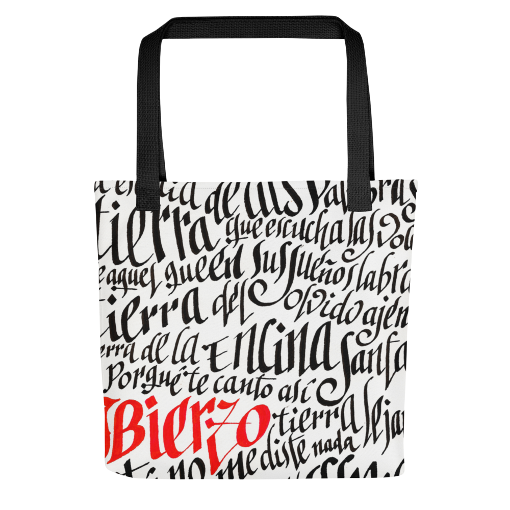 Letra de la canción de Miguel Guerrero : Bierzo tierra lejana. letras caligráficas, negras y palabra Bierzo en rojo, ilustradas en Tote bag blanca con cintas de color negro.